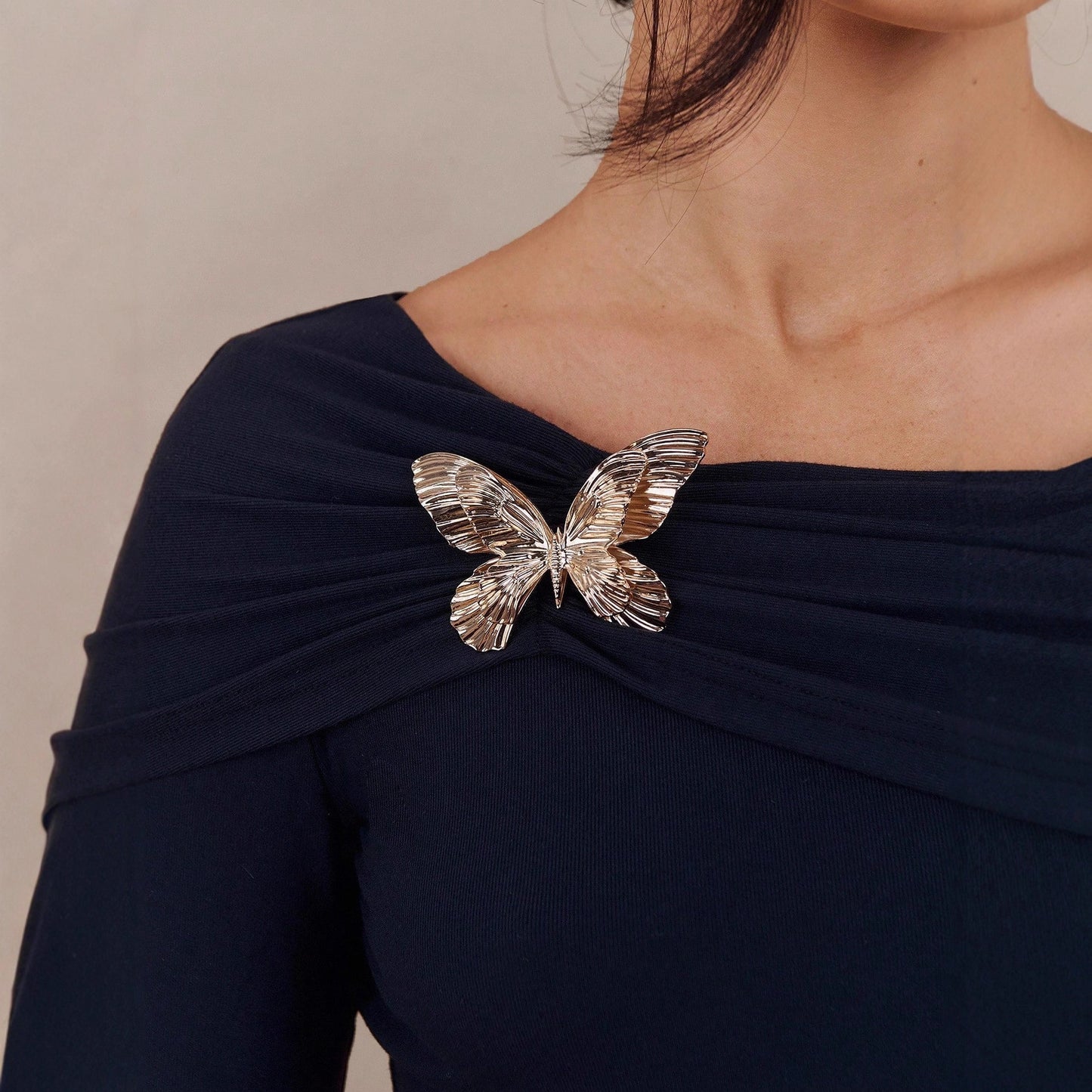 One shoulder butterfly brooch design slim fit long sleeved women's top